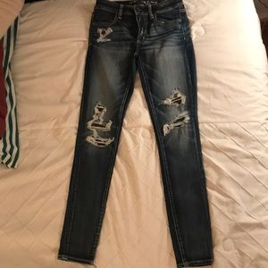 Washed/distressed jeans size 4